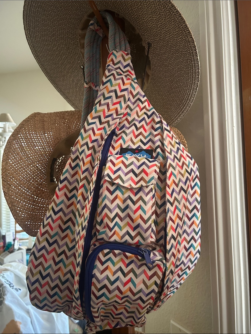 Kavu Multi-Color Chevron Sling Backpack - White Base with Blue Accents